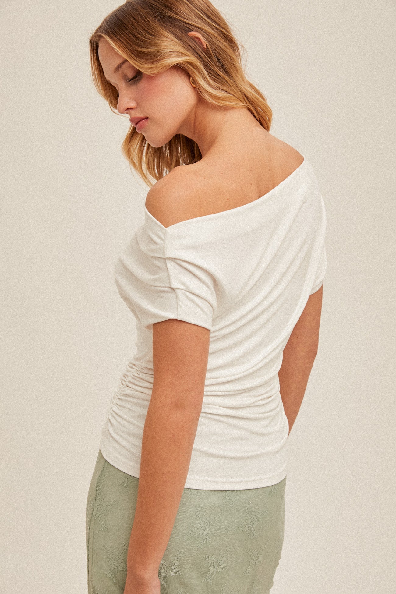 Asymetrical Neck Line Ruched Knit Top