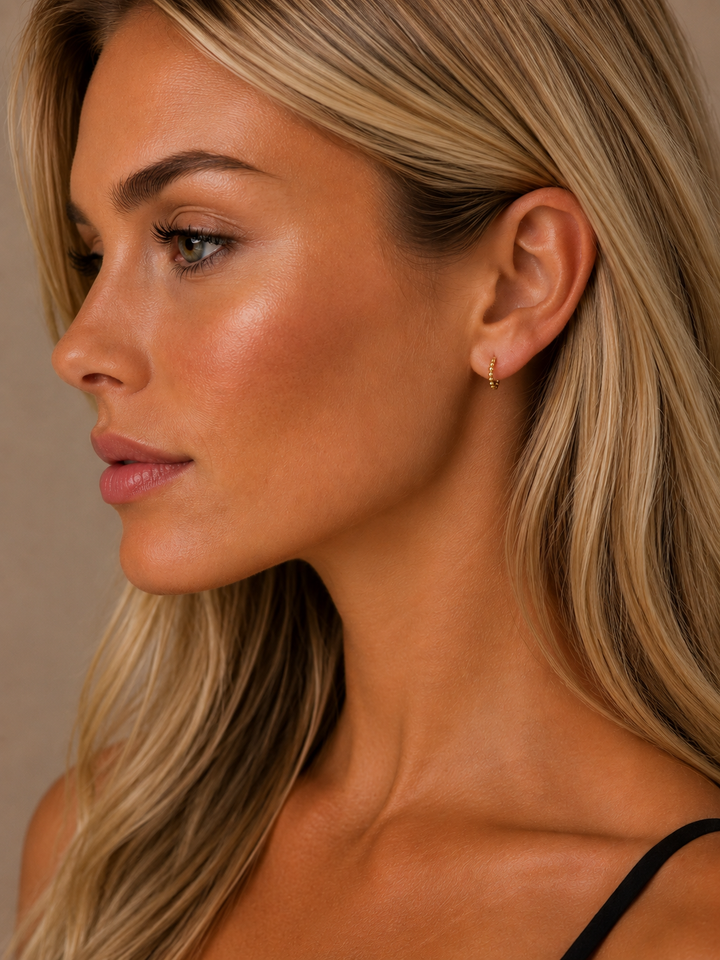 Mae petite ball huggie earring